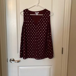 Burgundy shell with silver metallic dots. Like new
